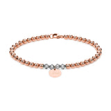 Personalisiertes Kugelarmband mit Swarovski Geburtssteinen aus Rosegold Filled mit Plättchen Anhänger und persönlicher Gravur